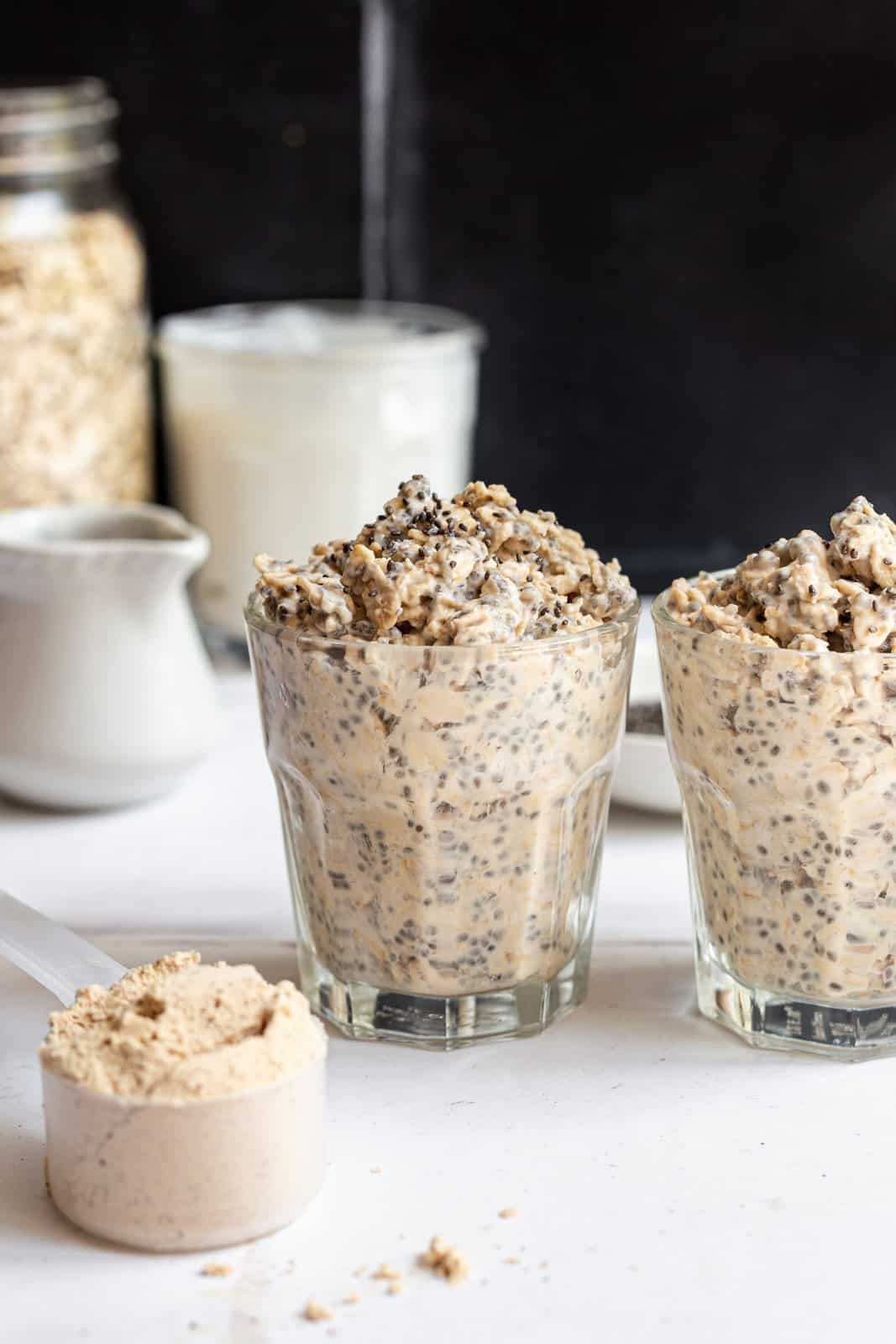 Two jars of protein powder overnight oats, ready to serve.