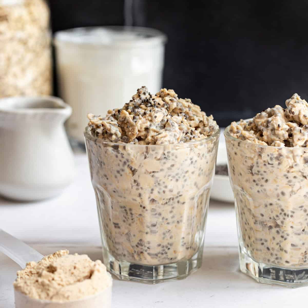 Two jars of protein powder overnight oats, ready to serve.