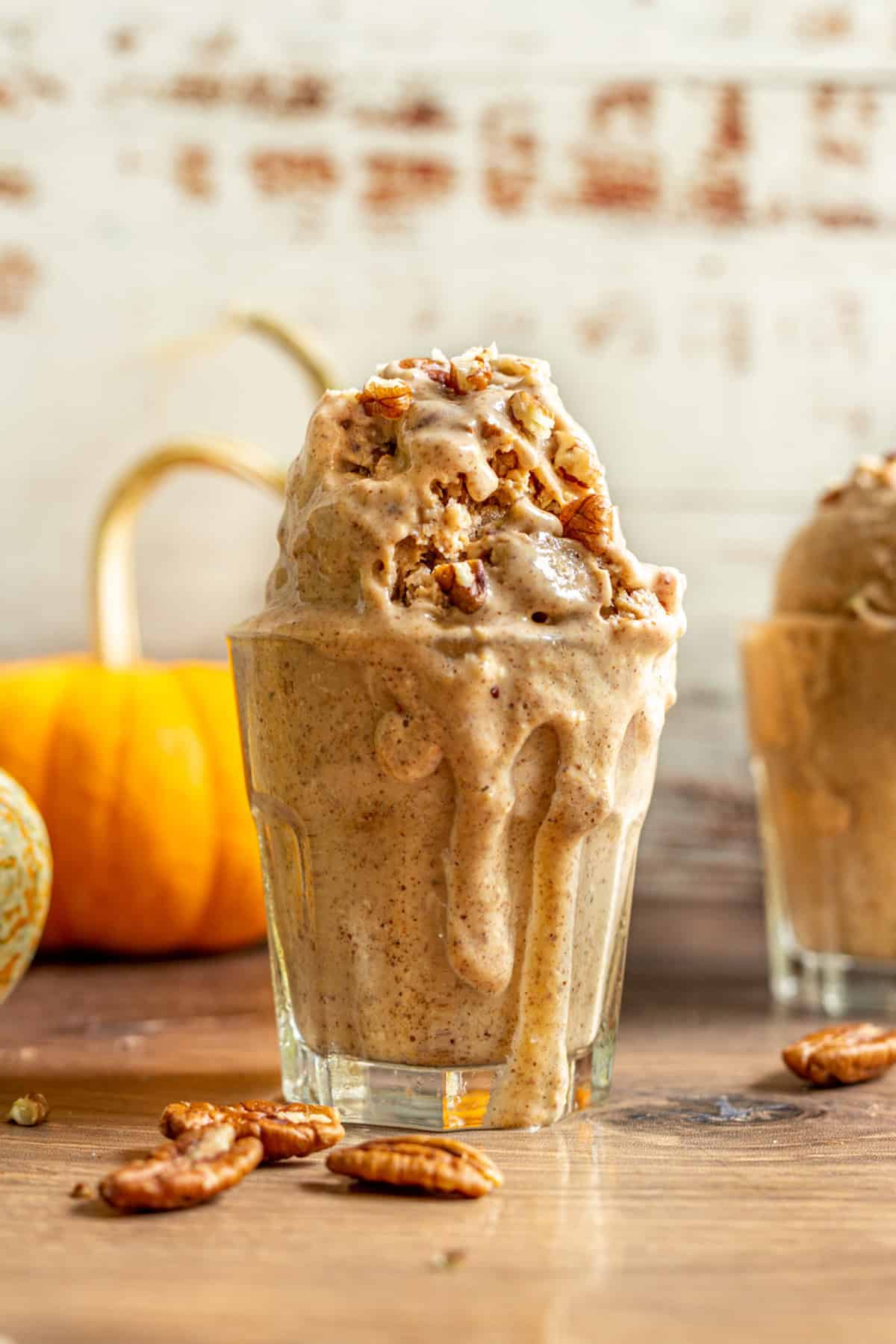 A glass full of pumpkin pecan ice cream.