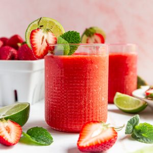 A glass of strawberry daiquiri mocktail.