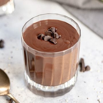 Vegan tahini hot chocolate topped with chocolate chips.