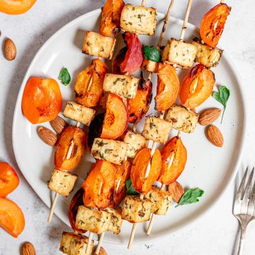 A plate of tofu apricot skewers, ready to serve.