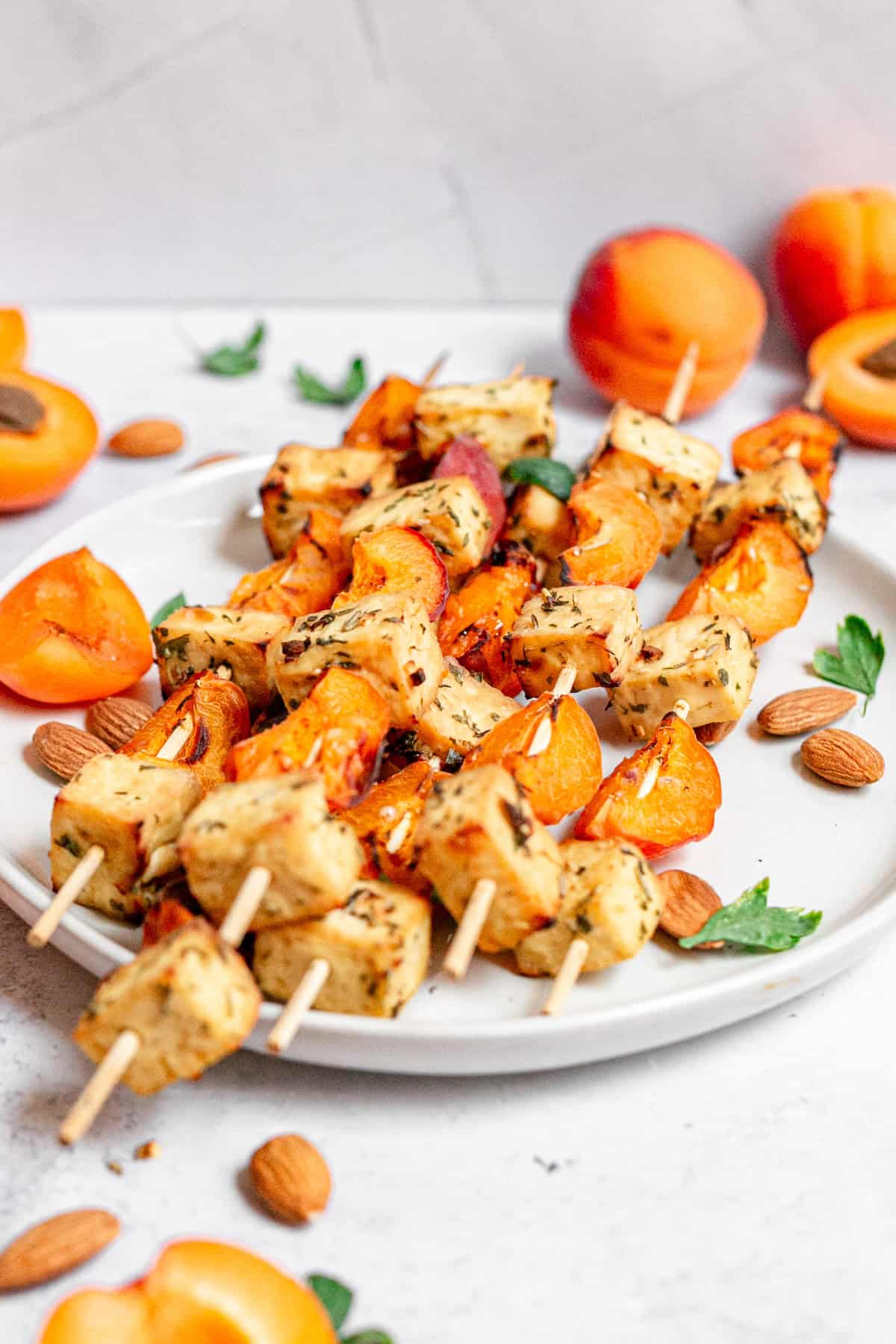 A plate of tofu apricot skewers, ready to serve.