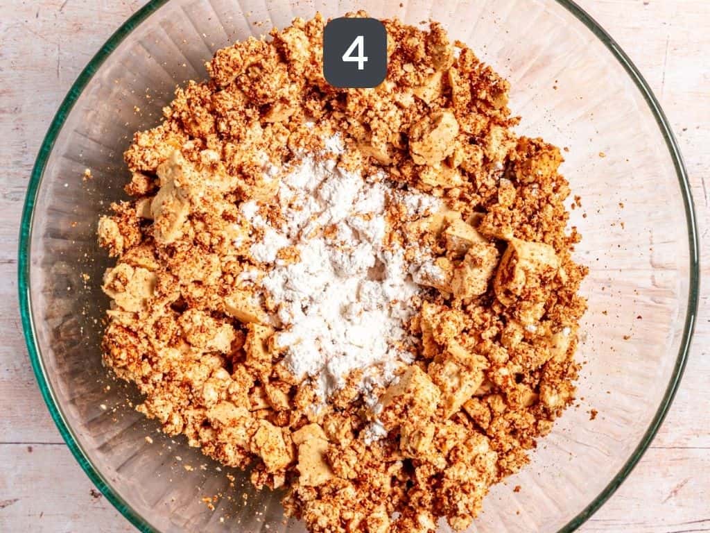 Tofu crumble and black bean tacos step 4 - toss with cornstarch.