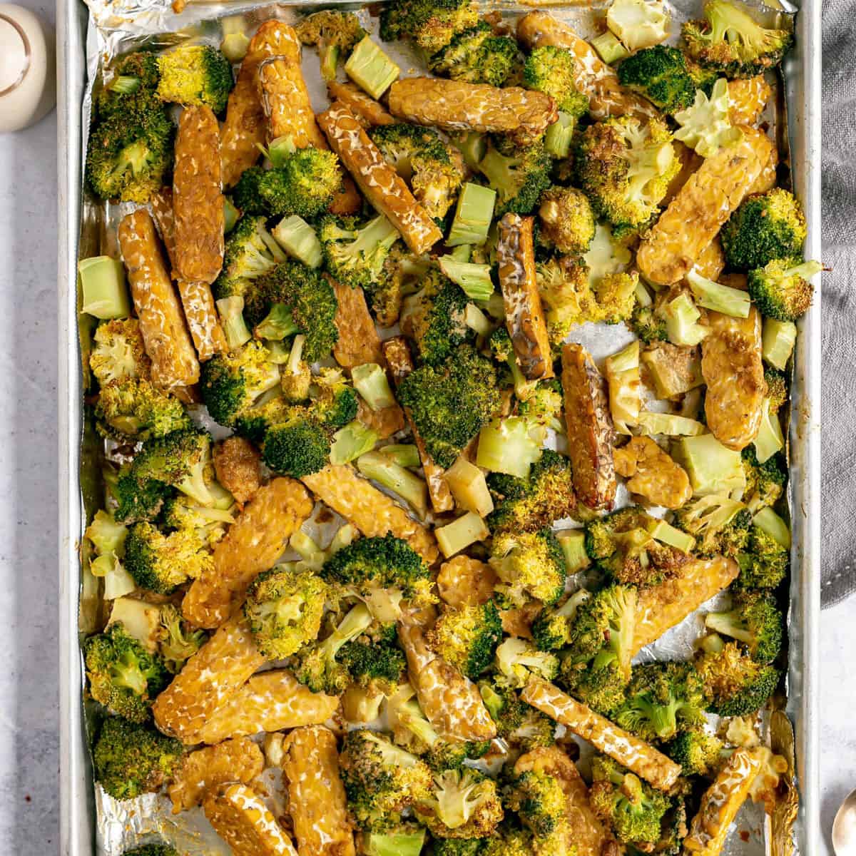 A sheet pan of broccoli and tempeh.