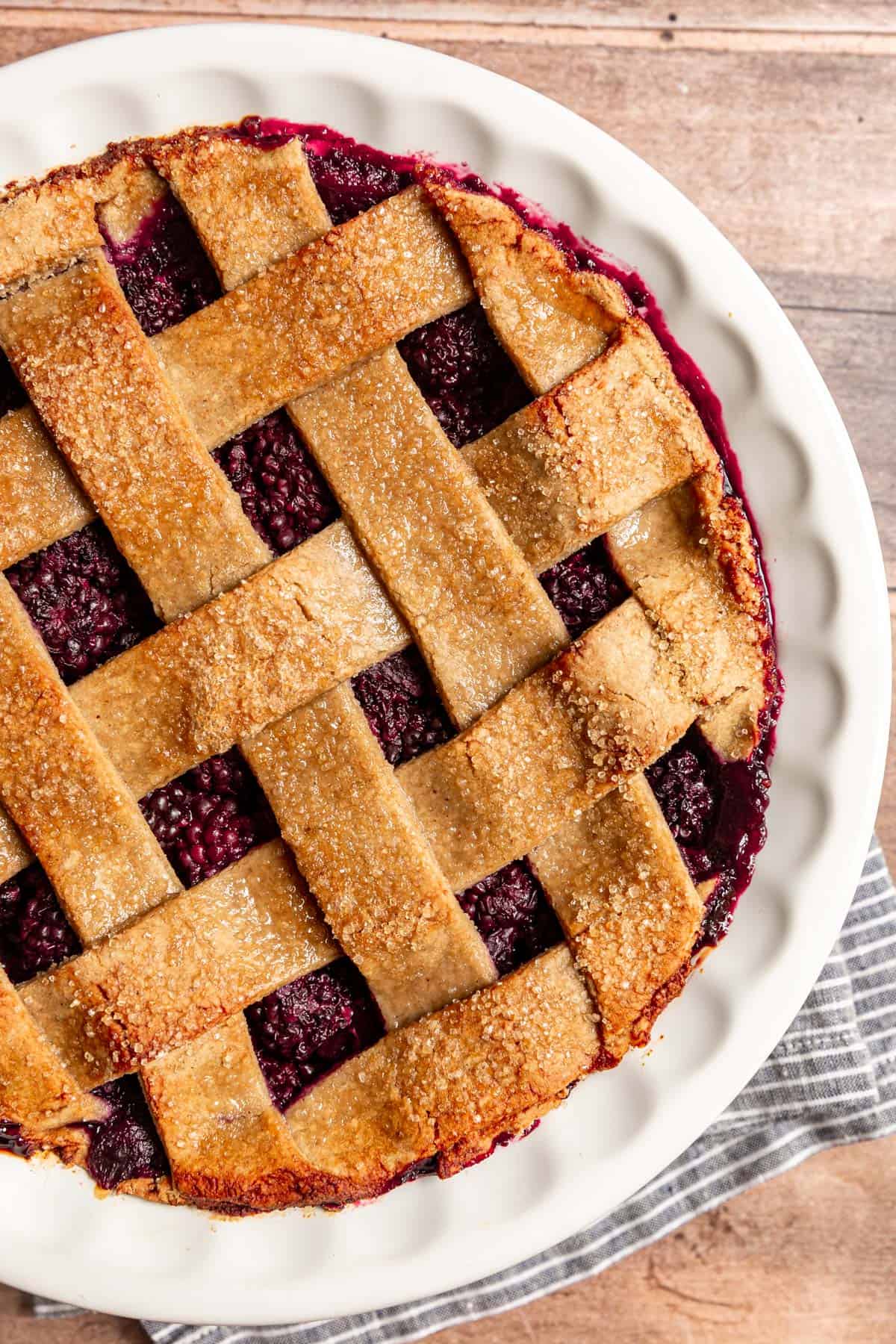 A freshly baked Vegan Blackberry Pie, featuring the lattice topping.