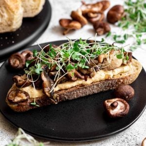 A plate of vegan mushroom toast.