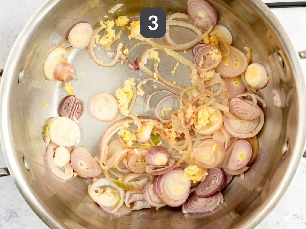 Vegan risotto step 3 - add the garlic.