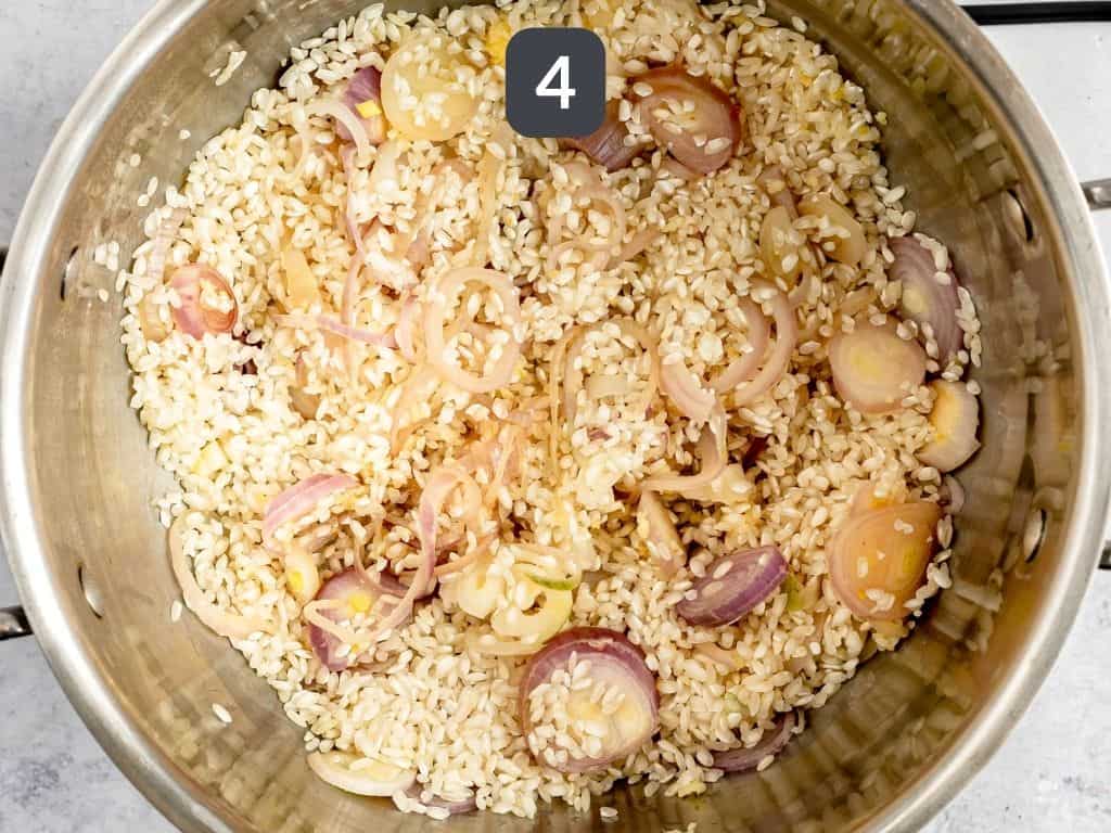 Vegan risotto step 4 - add the rice and wine.