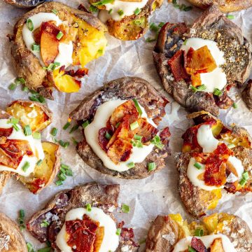 A tray of vegan smashed potatoes.