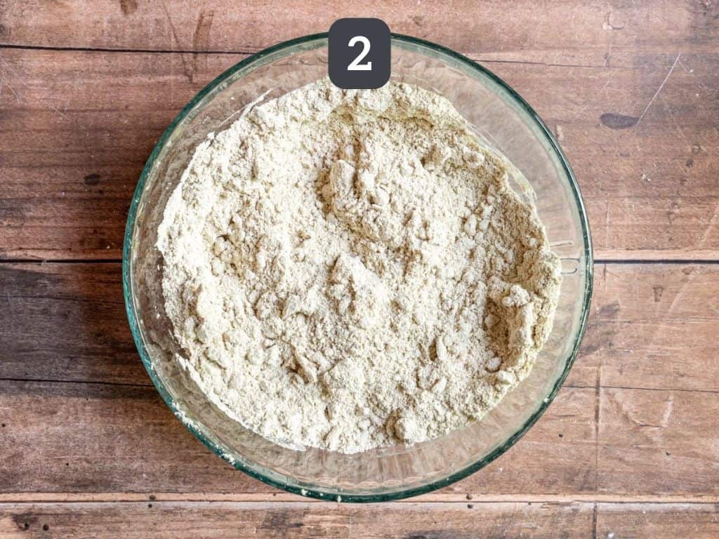 WFPB Pie crust step 2 - mix in the nut butter and syrup.