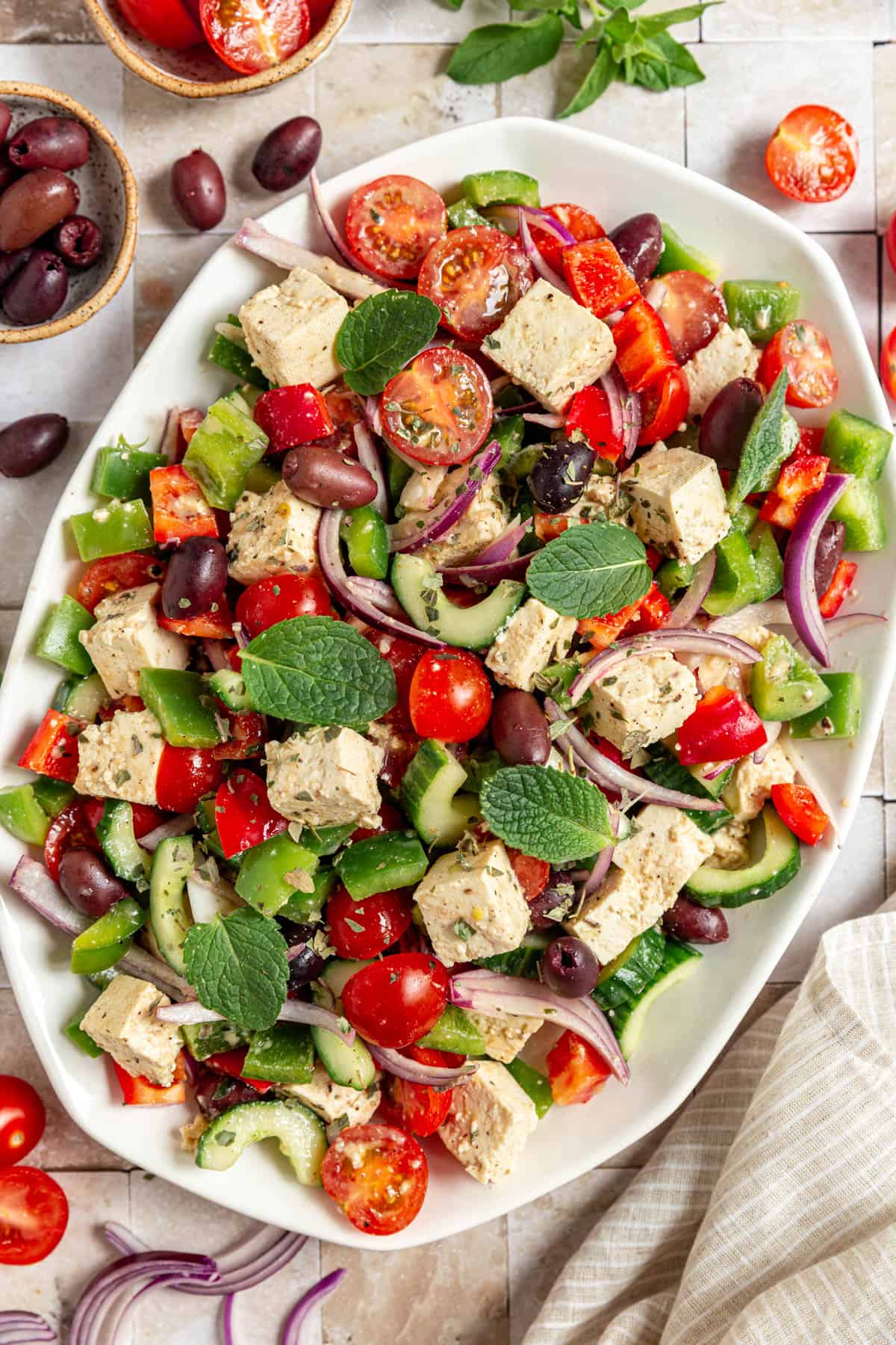 Vegan Greek Salad served on a platter.