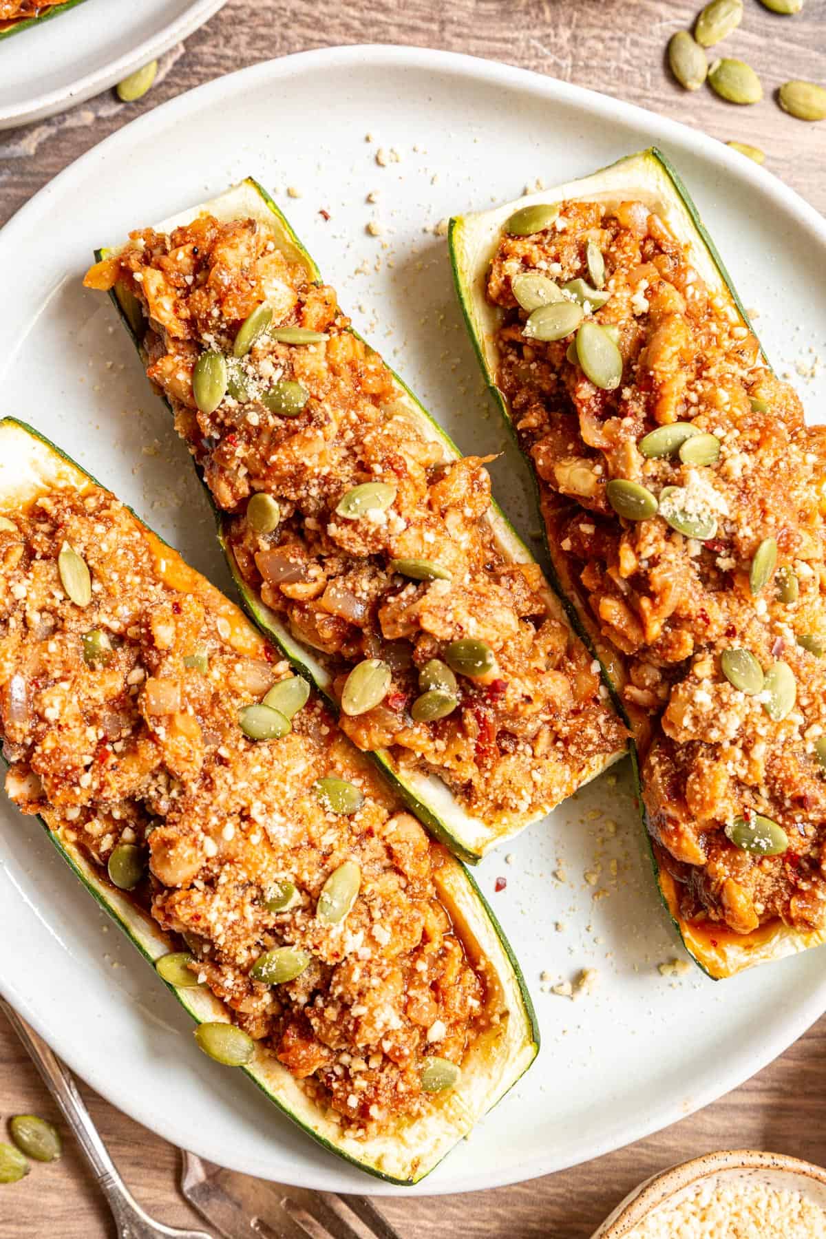 A plate of three Vegan Zucchini Boats.