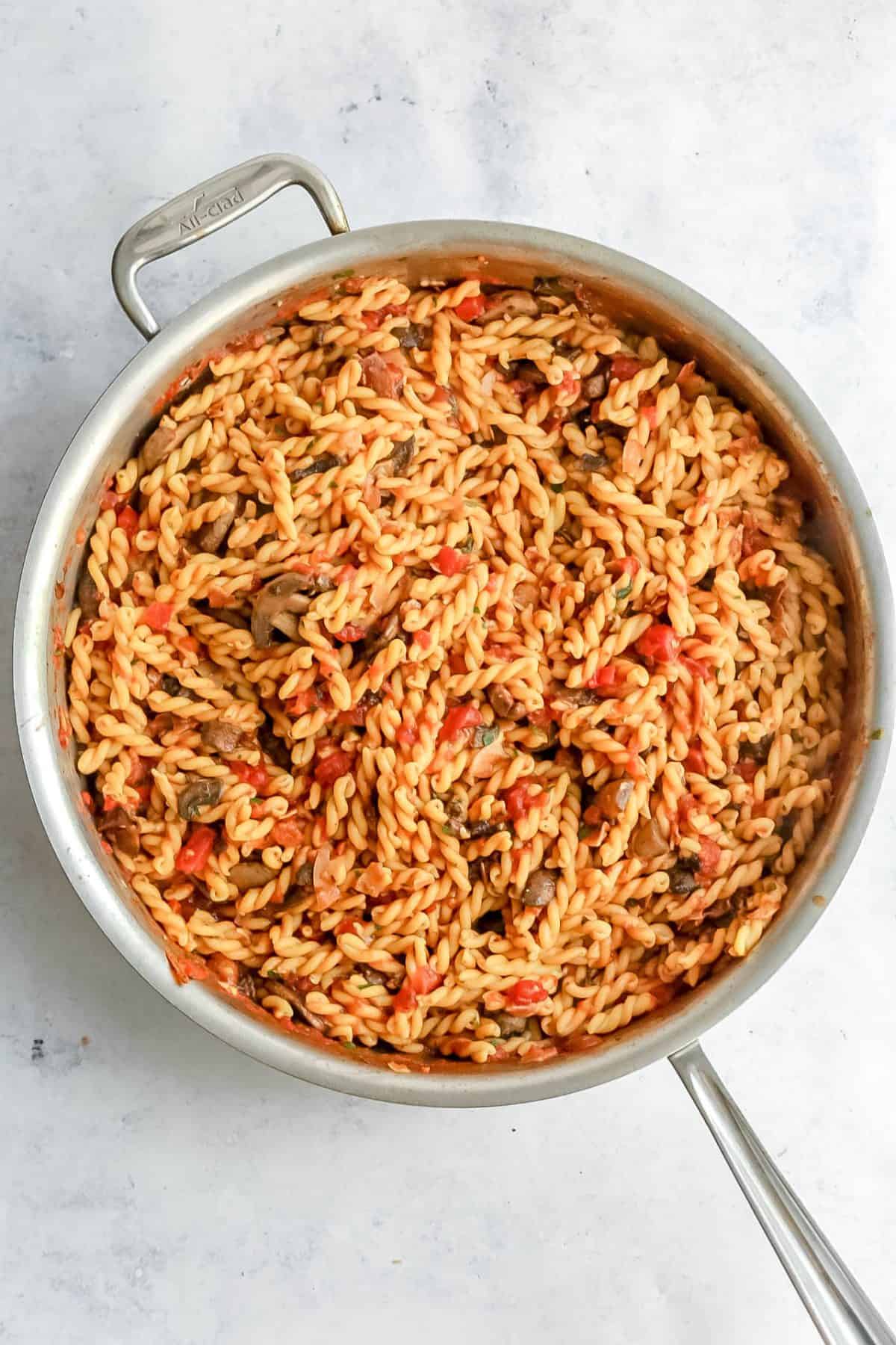 Gemelli with Tomato Sauce and Mushrooms in pan
