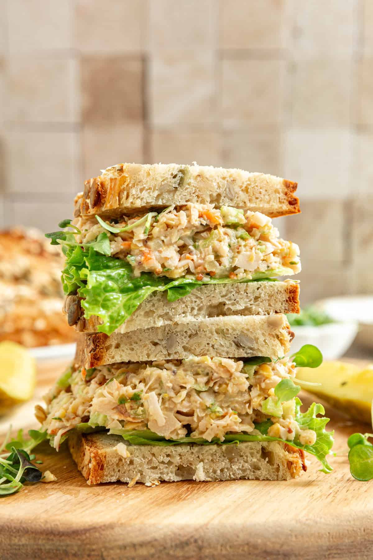 Two halves of a vegan tuna salad sandwich.
