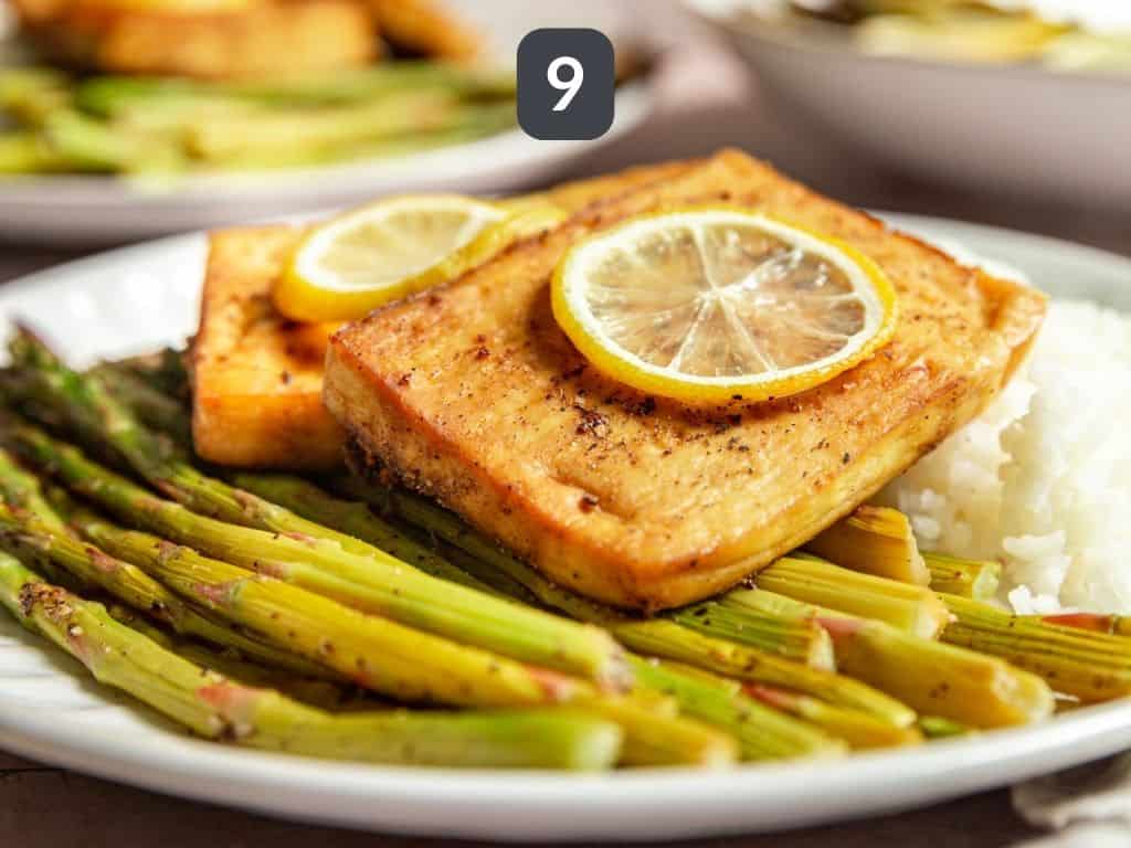 Lemon Pepper Tofu Step 9 - serve the tofu and asparagus over rice.