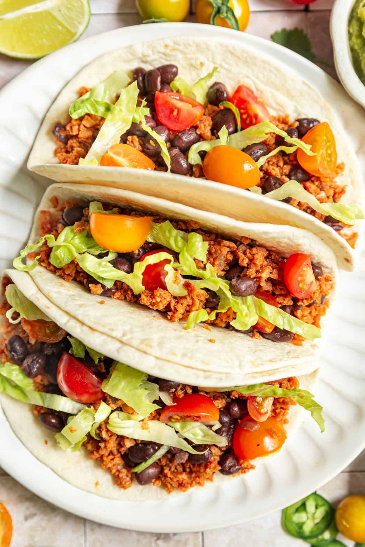 Three TVP tacos on a plate.
