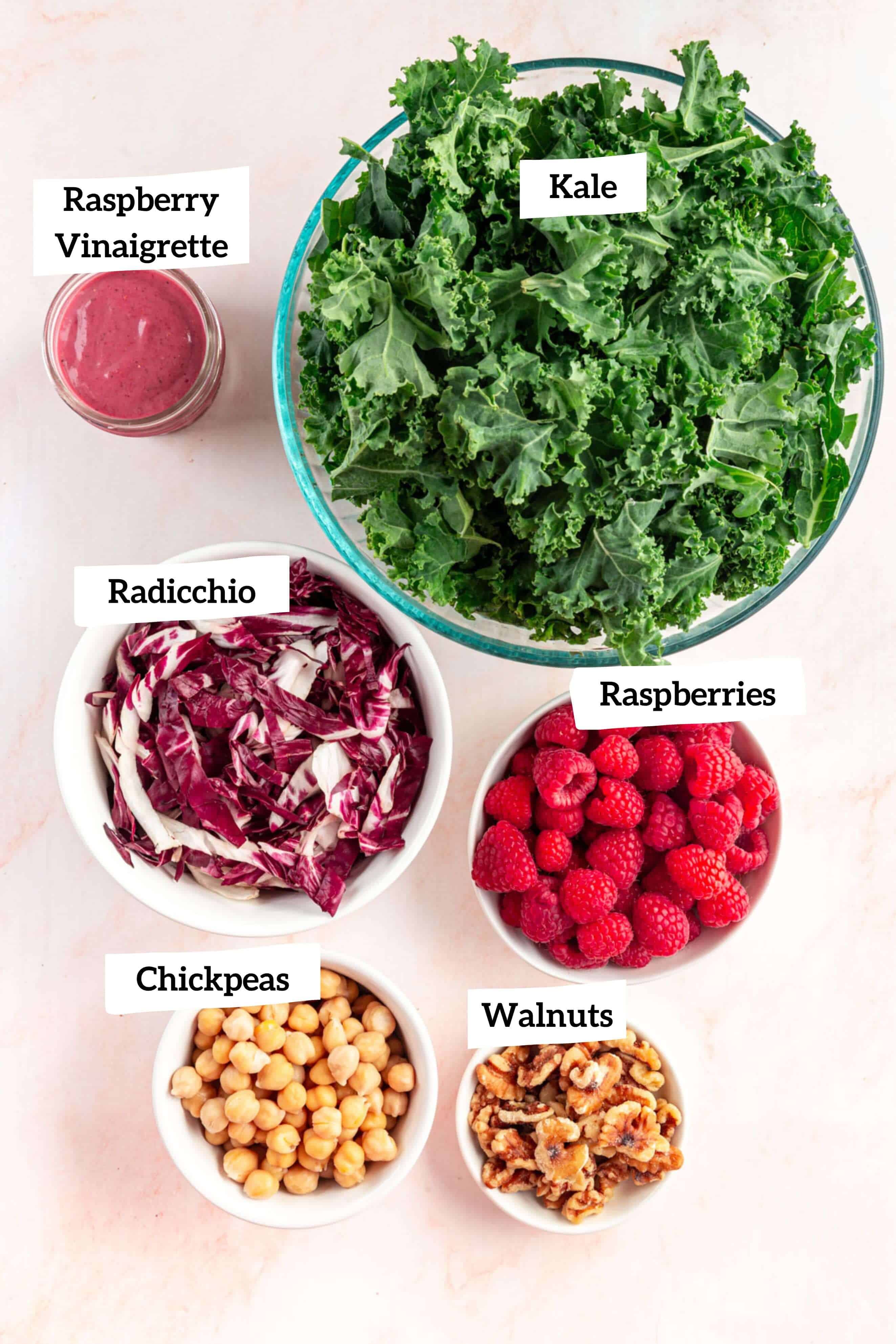 Raspberry Walnut Kale Salad ingredients in bowls.