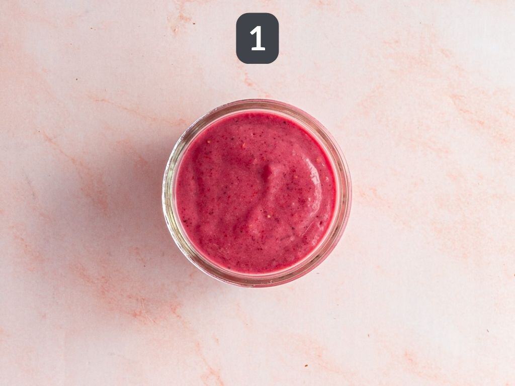 Raspberry Walnut Kale Salad step 1 - make Raspberry Vinaigrette.