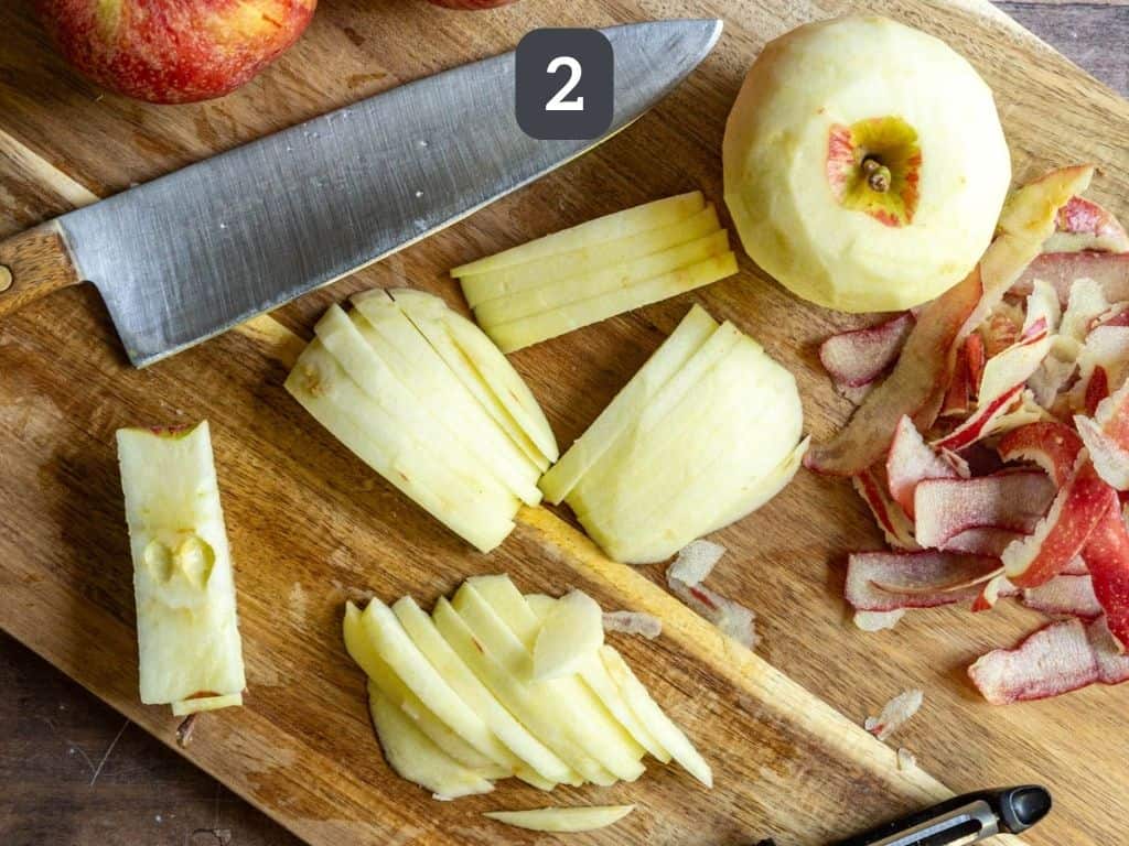 Gluten free vegan apple pie step 2 - peel and slice the apples.