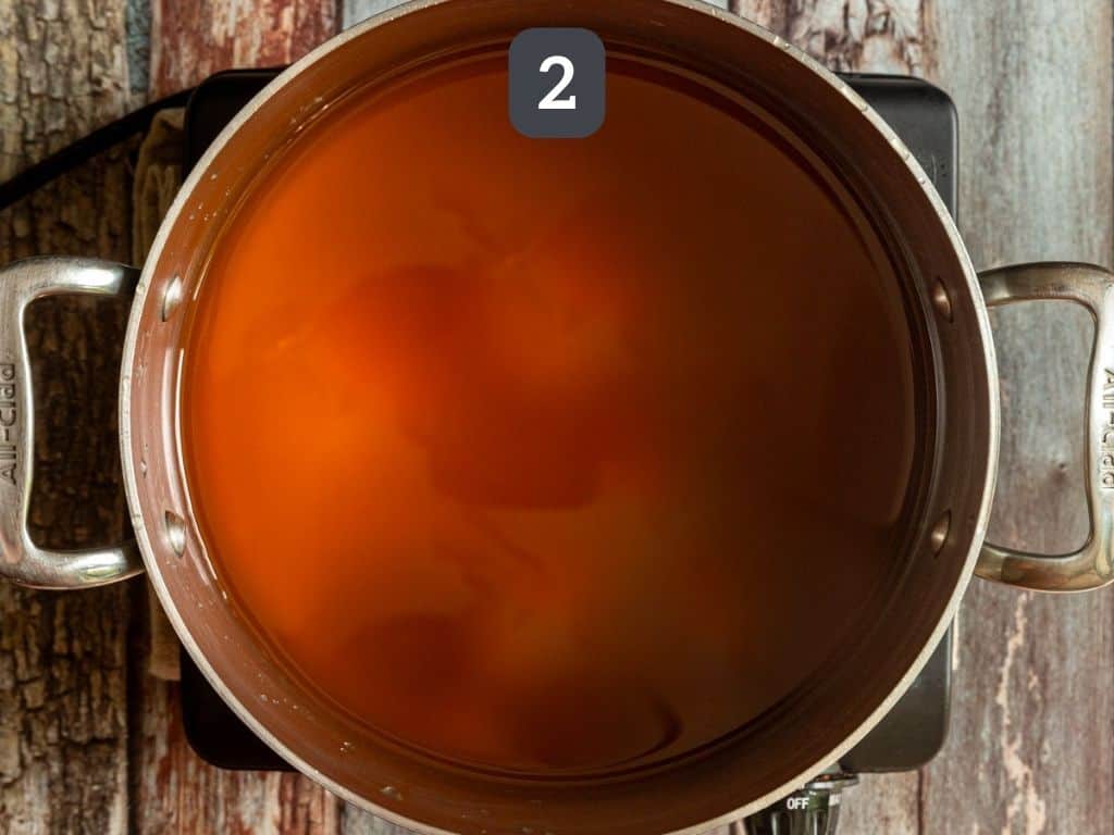 Roasted Garlic and Butternut Squash Risotto Step 2 - heat the broth.