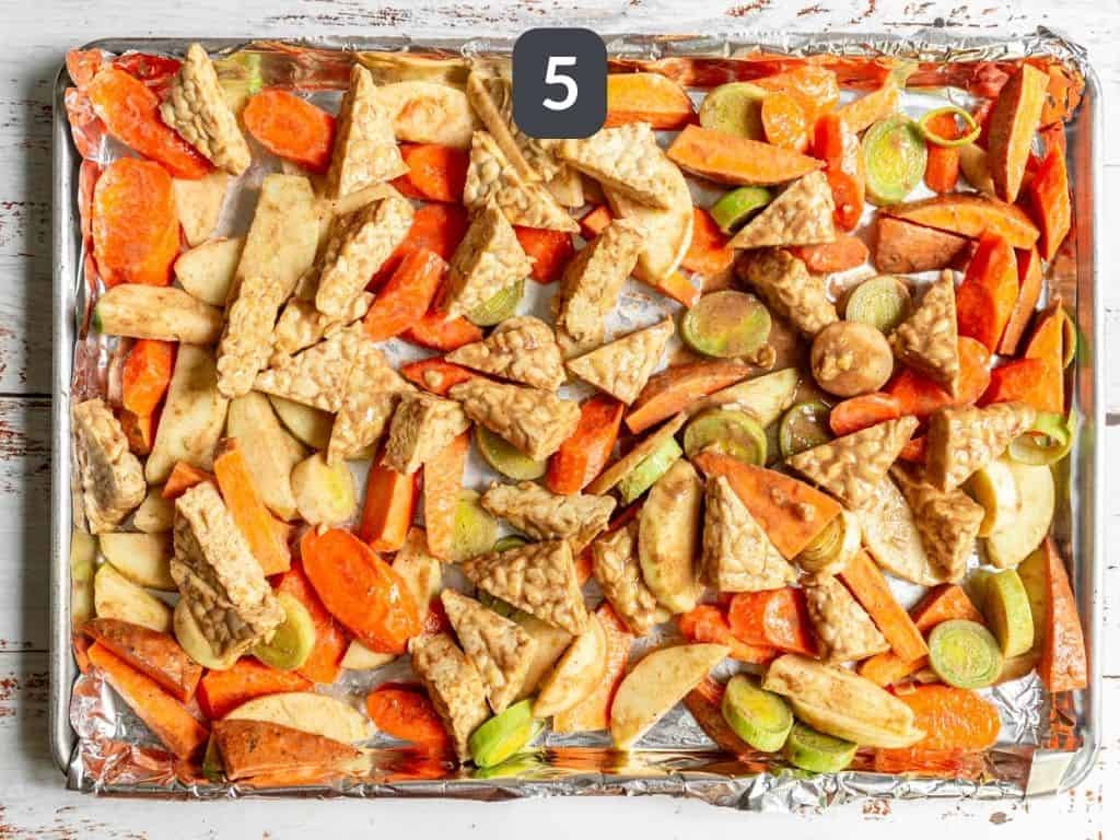 Sheet pan tempeh step 5 - place the tempeh and vegetables on the baking sheet.