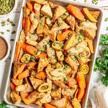 A sheet pan full of roasted tempeh and vegetables.