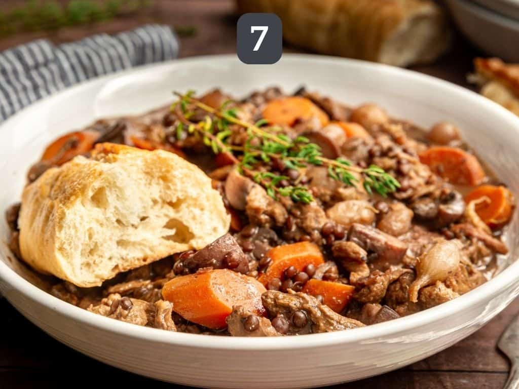 Vegan Coq Au Vin Step 7 - serve with bread and a garnish of thyme.