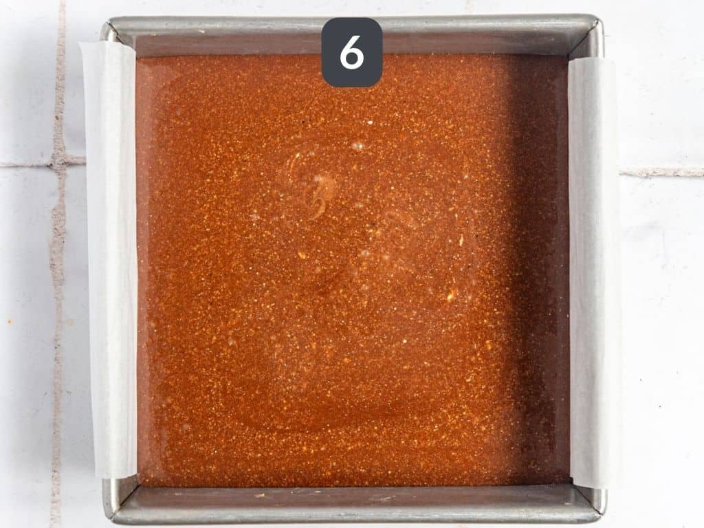 Vegan twix bars step 6 - pour the caramel onto the cookie layer.