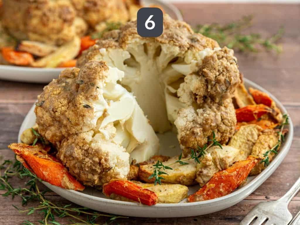 Whole Roasted Cauliflower Step 6 - serve with a garnish of thyme.