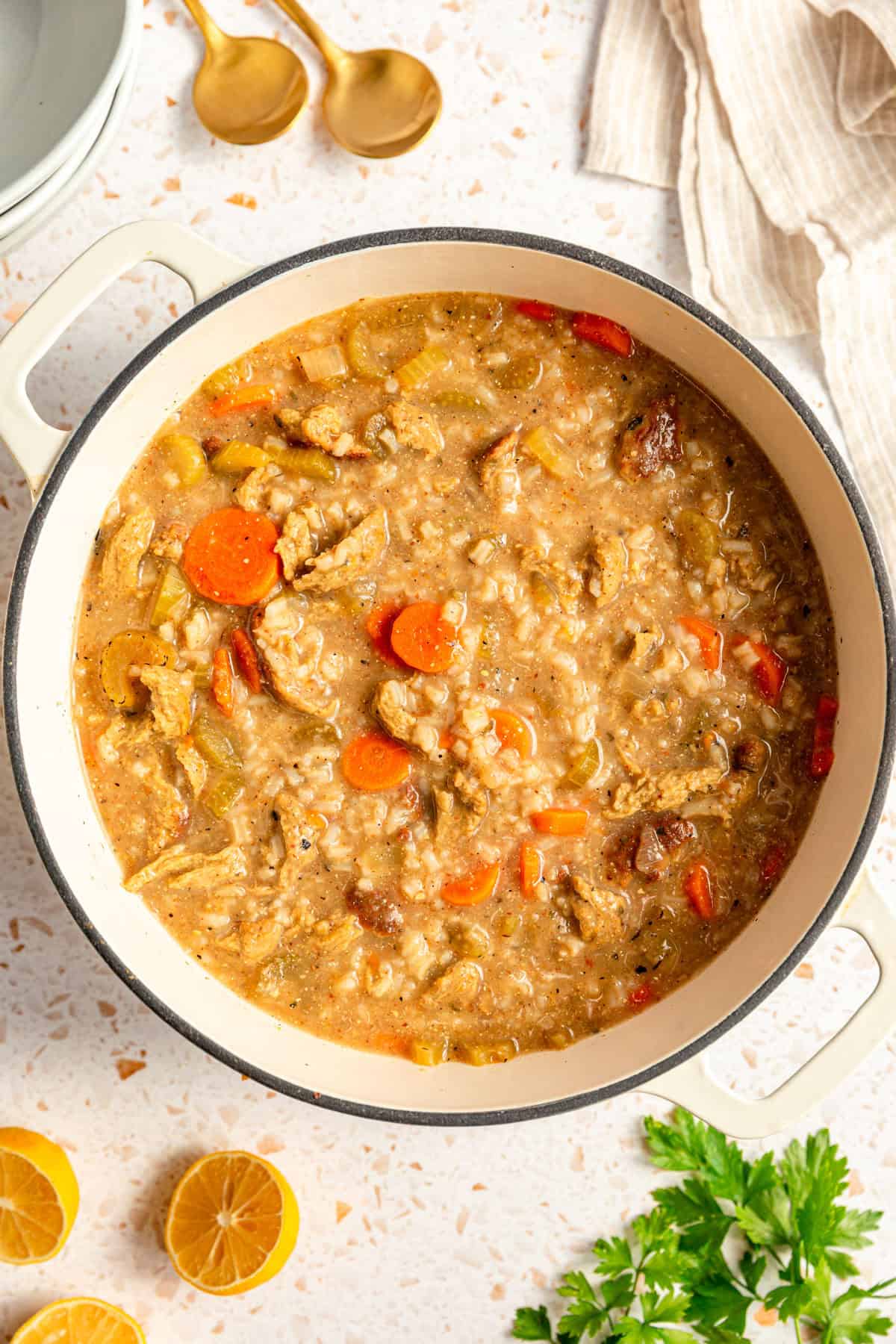 A freshly cooked pot of Vegan Chicken Lemon Rice Soup.