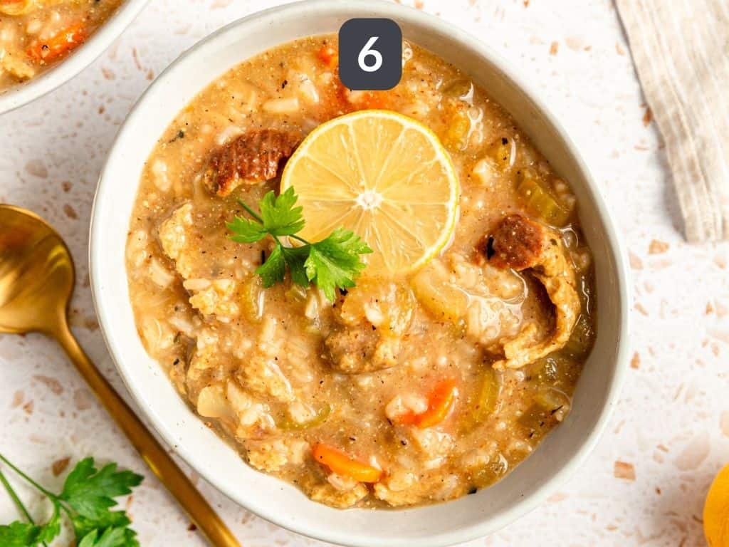 Vegan Chicken Lemon Rice Soup Step 6 - serve with parsley and a lemon slice.