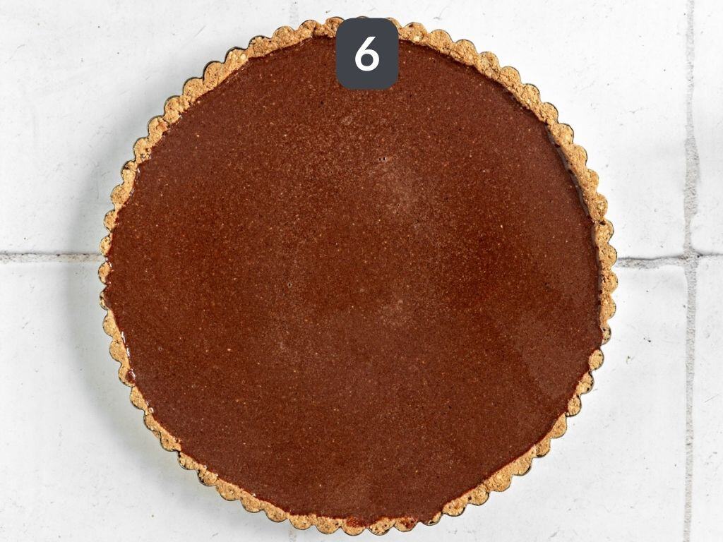 Vegan Chocolate Hazelnut Tart Step 6 - pour the filling into the crust.