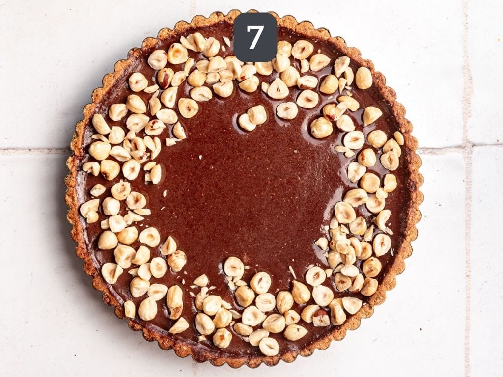 Vegan Chocolate Hazelnut Tart Step 7 - refrigerate, then add hazelnuts.
