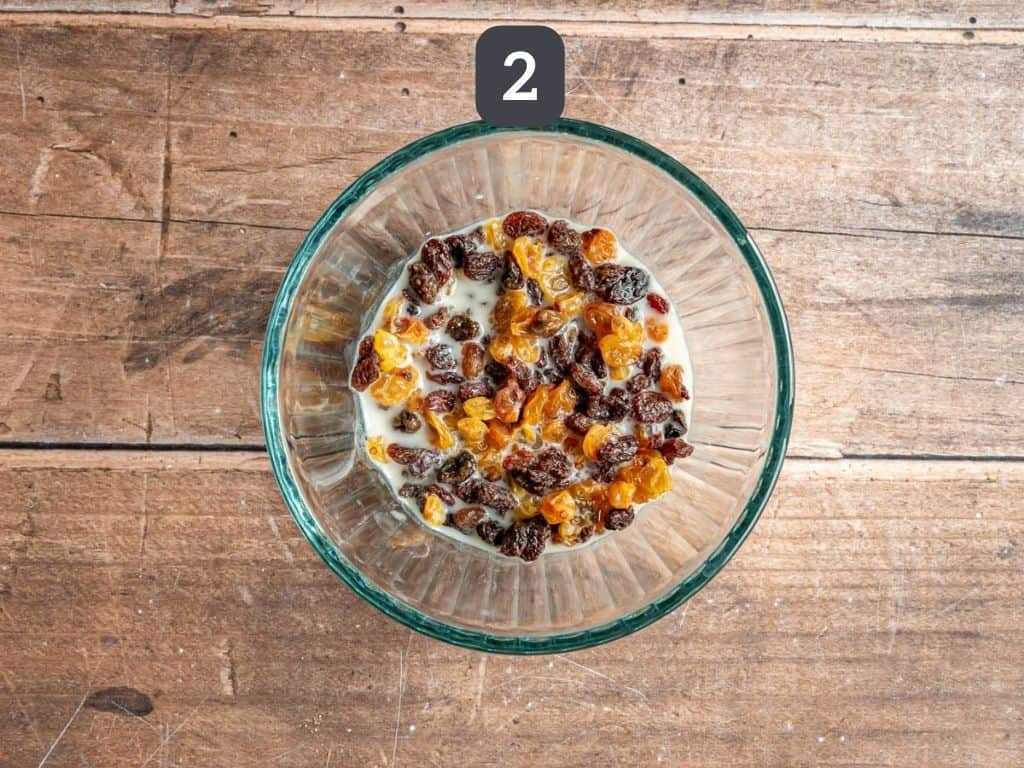 Vegan Gluten Free Bread Pudding Step 2 - soak the raisins in milk.