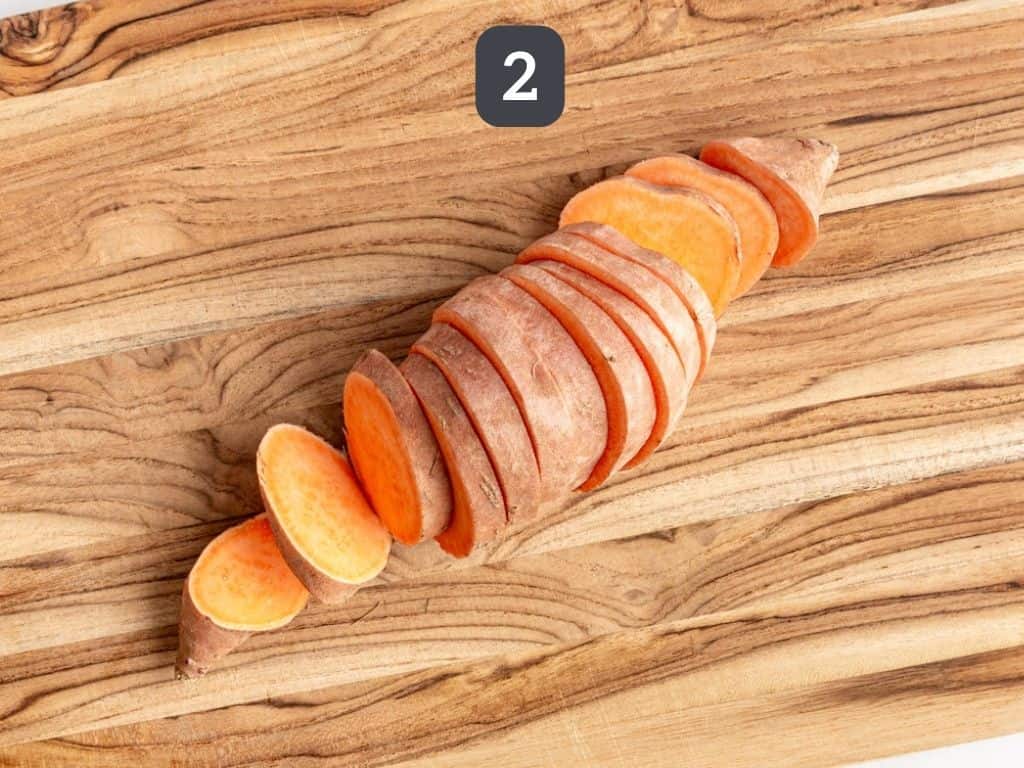 Sweet potato crostini step 2 - slice the sweet potatoes.