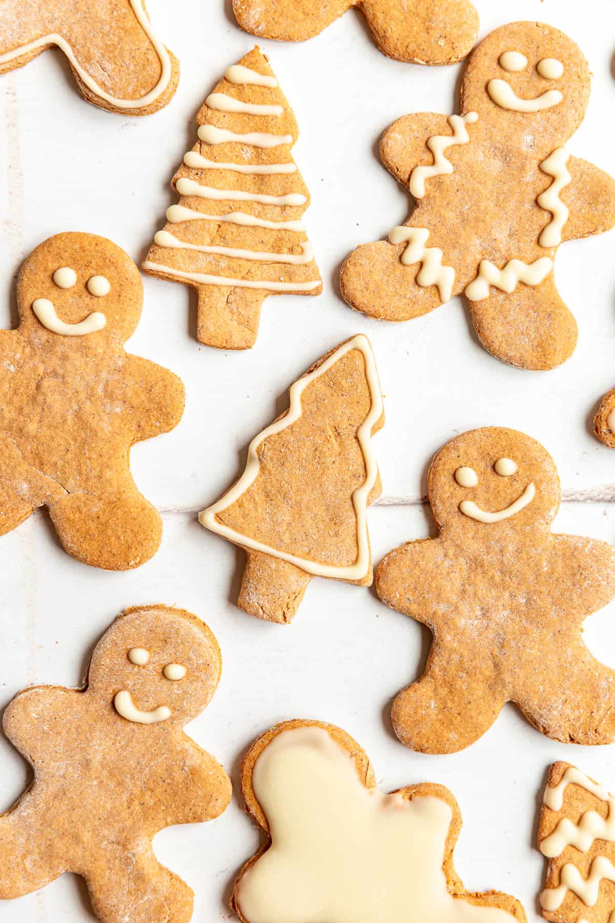 Decorated Vegan Gingerbread Cookies on a countertop.