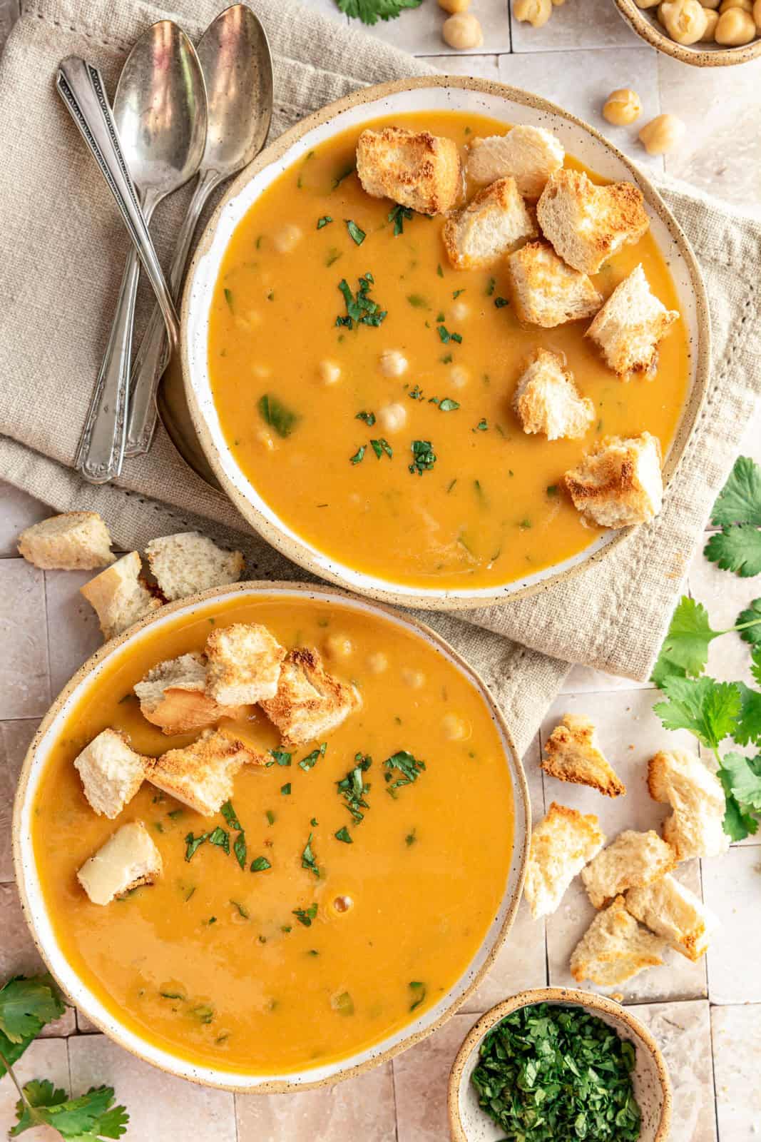 two bowls of Vegan Garlic Chickpea Soup (Blended)
