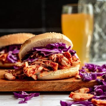 A barbeque jackfruit sandwich on a board, ready to serve.