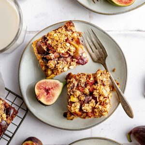 A plate with two fig crumble bars.