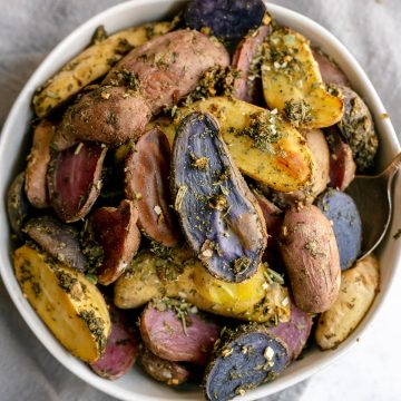 A bowl of herb roasted fingerlings.