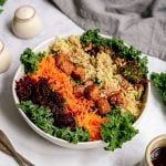 A spicy kale grain bowl ready to serve.