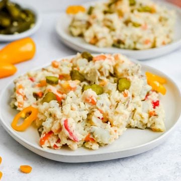 A plate of German style vegan potato salad, ready to serve.