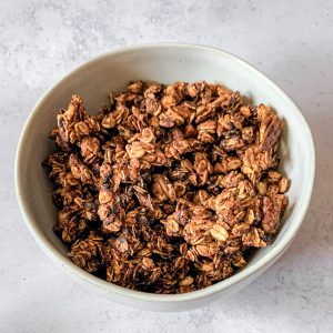 A bowl of vegan cheesy granola.