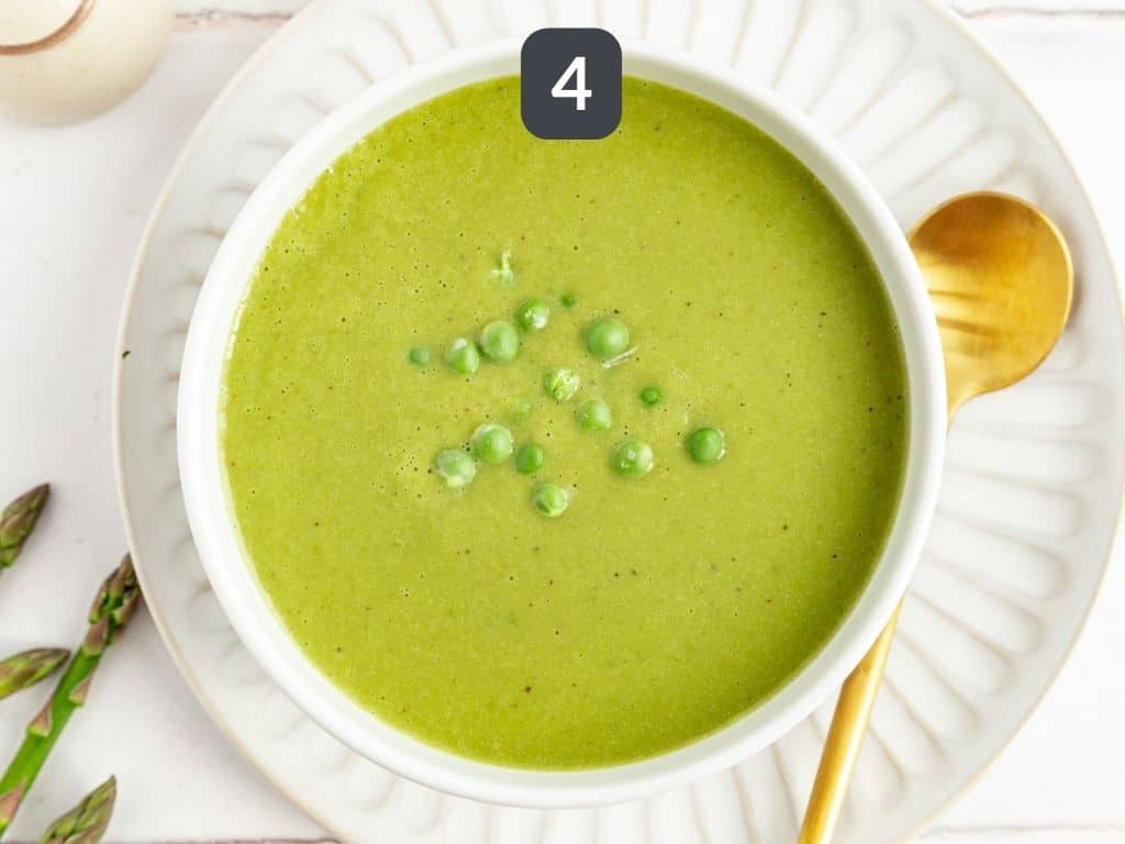 Vegan Asparagus Soup Step 4 - serve with a garnish of fresh peas.