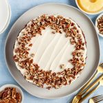 A freshly iced vegan hummingbird cake, ready to serve.