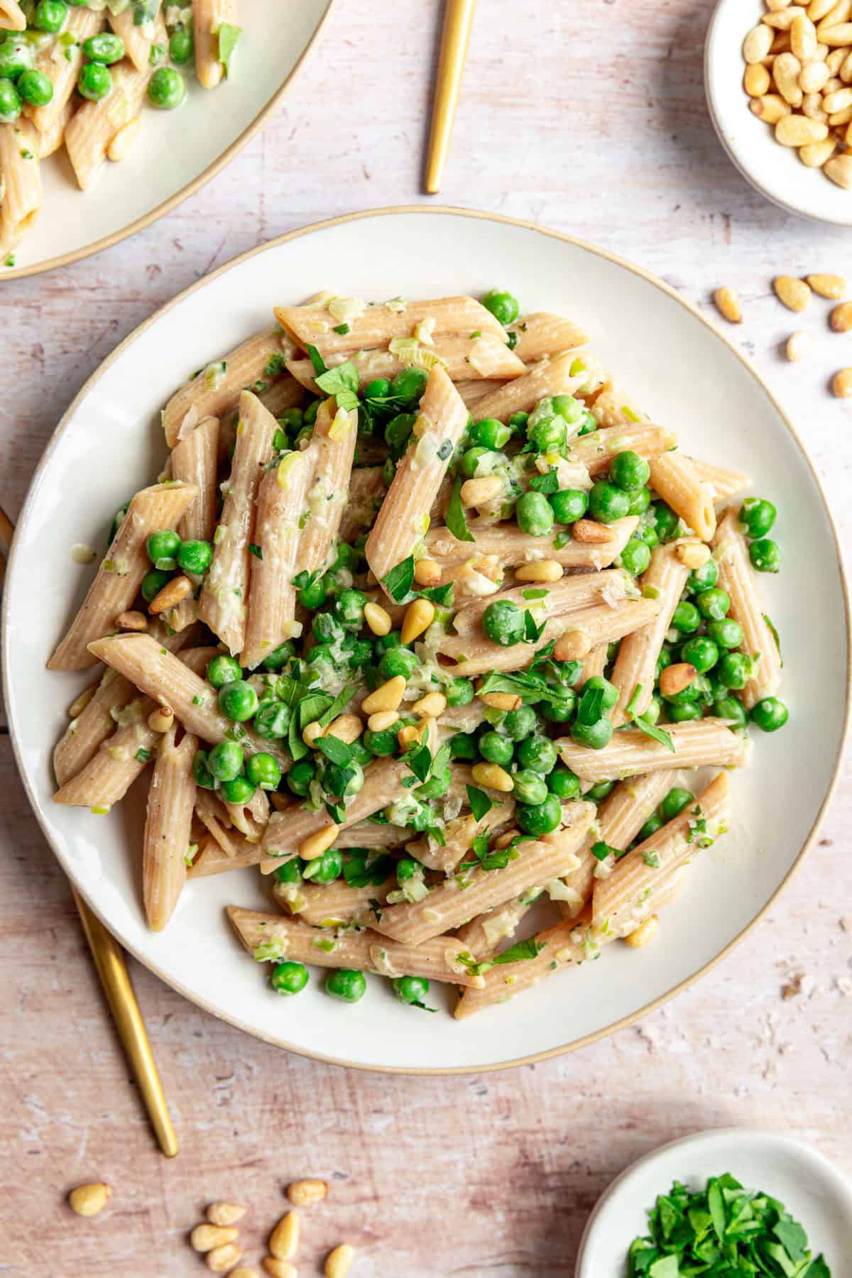A freshly cooked plate of pea and spring onion pasta.