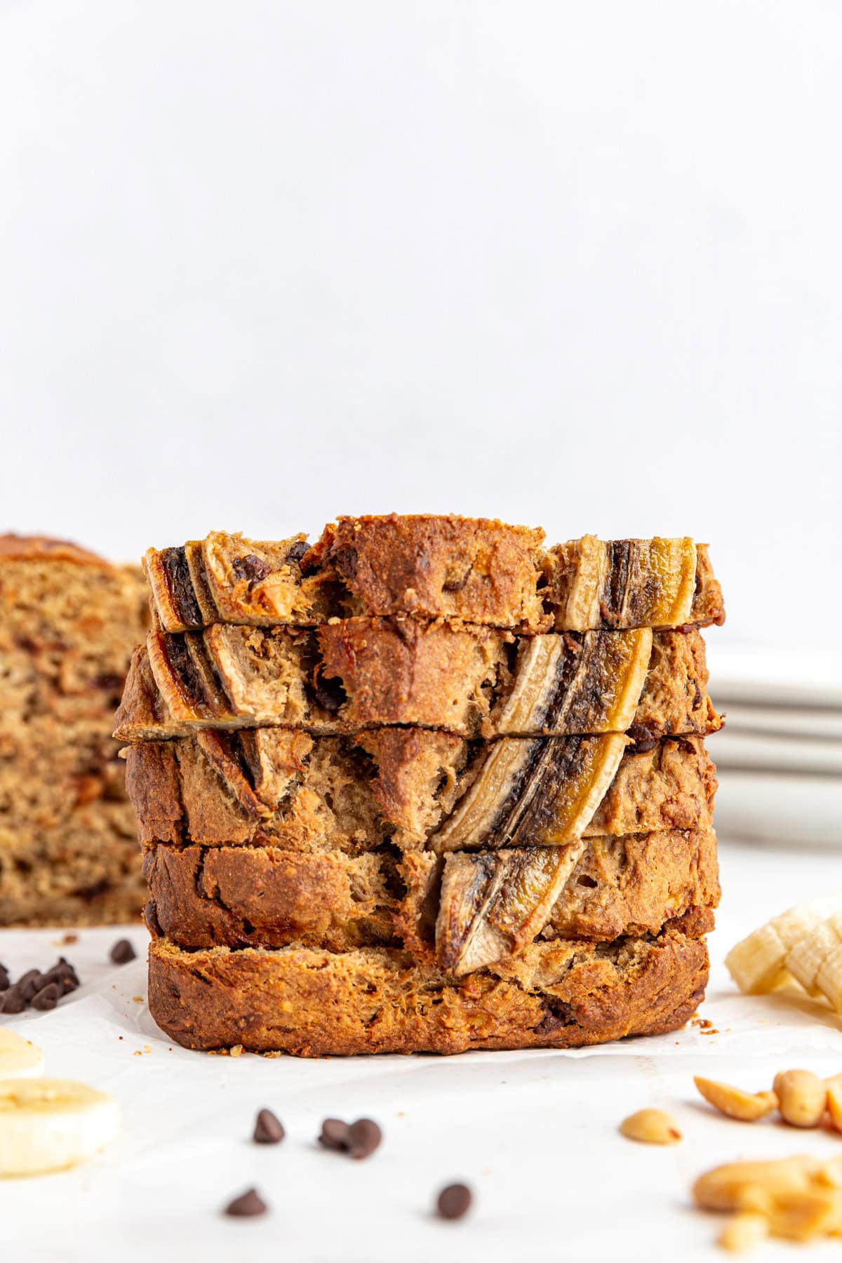 A stack of vegan peanut banana bread slices.