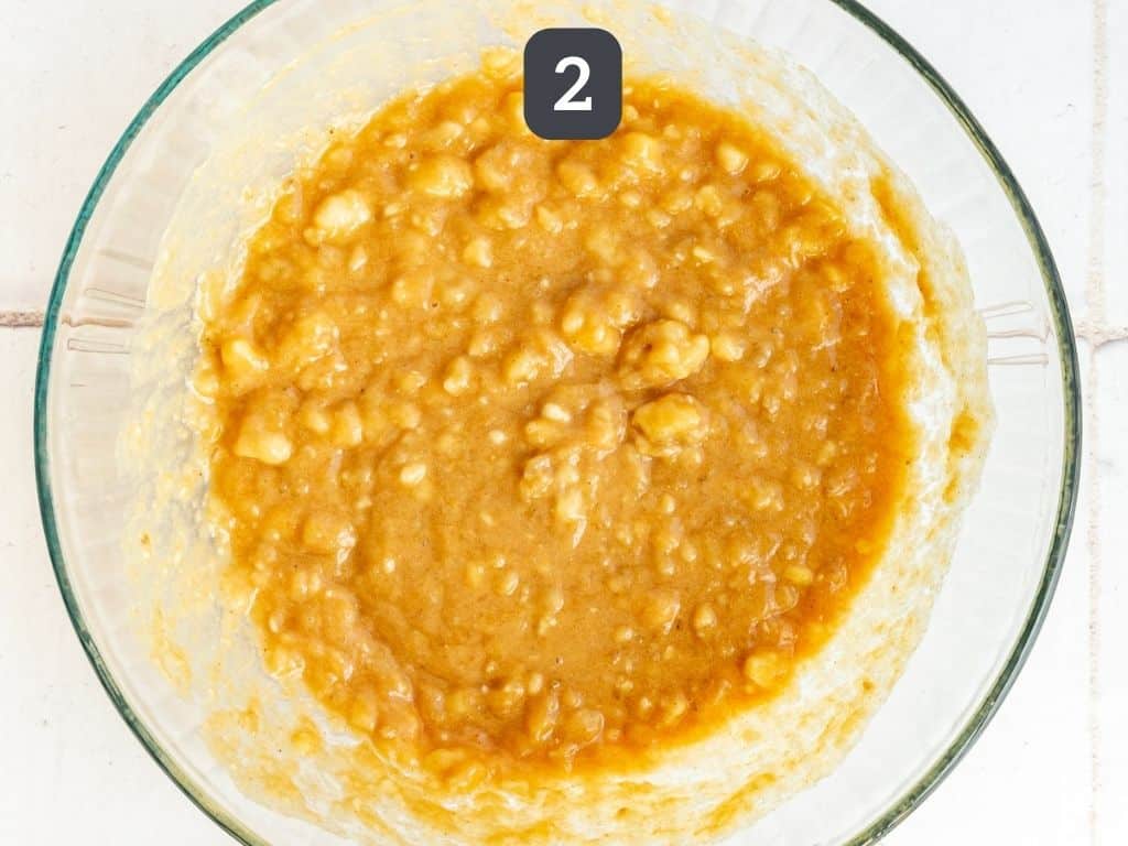Vegan Peanut Butter Banana Bread Step 2 - mash the bananas and mix the wet ingredients.