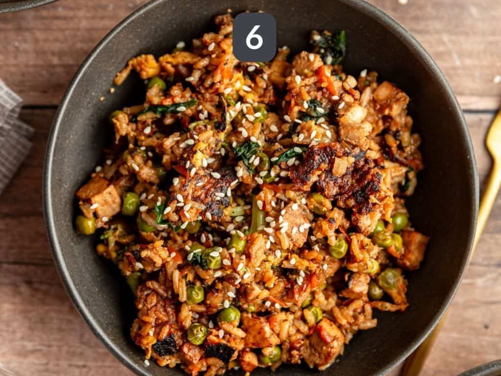 Vegan Weeknight Fried Rice Step 6 - serve with sesame seeds.